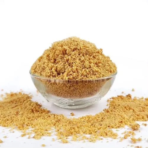 Groundnut shell powder granules in a glass bowl